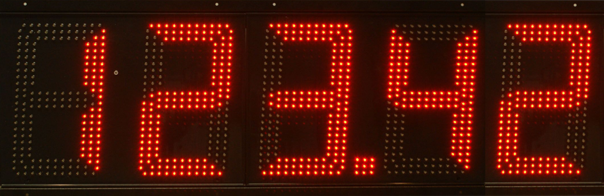 Red 6 inch LED gas price sign displaying 2.556
