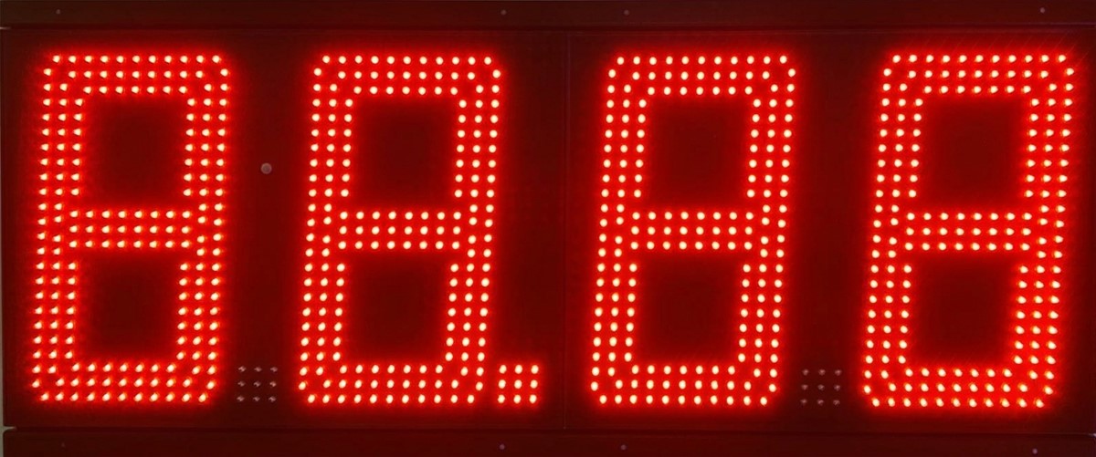 Red 6 inch LED gas price sign displaying 2.556