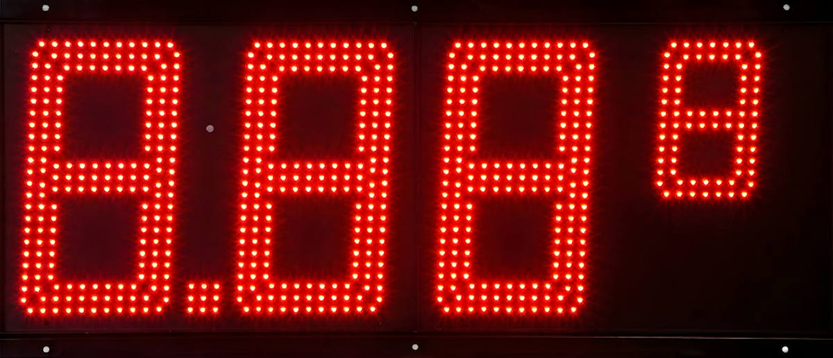 Red 6 inch LED gas price sign displaying 2.556