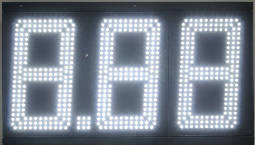 Red 6 inch LED gas price sign displaying 2.556